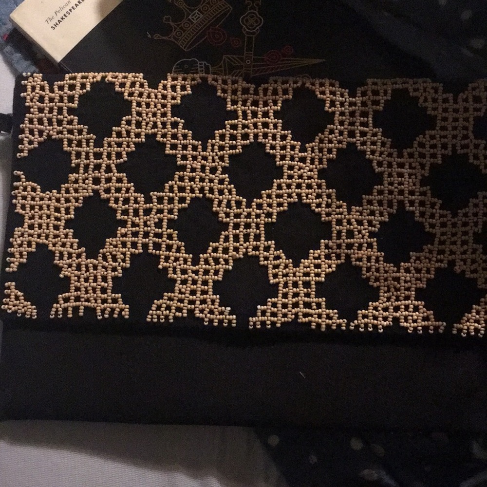 Clutch with beaded pattern